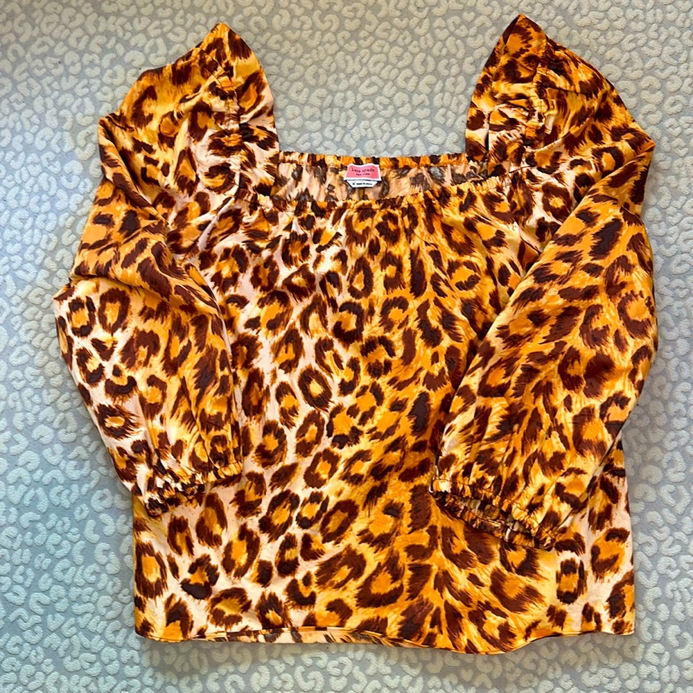Kate Spade animal print, beautiful oranges and browns on a cream base  size XL